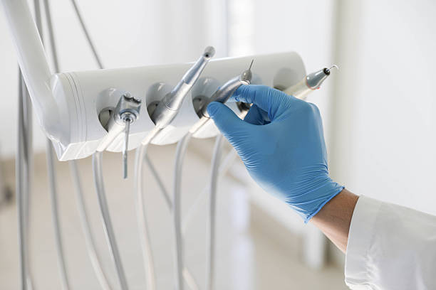 Professional Invisalign Clear Aligners technician working in East Farmingdale, NY